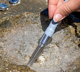 Measuring beachrock photosynthesis.