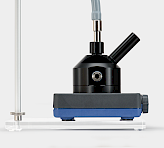 Modified magnetic stirrer plate holding the KS-2500 suspension cuvette, with stand bar for mounting fiber optics above the cuvette
