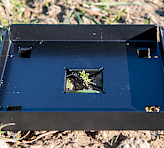 Dark Acclimation Box. Aluminum base plate with center opening for plant to be investigated.