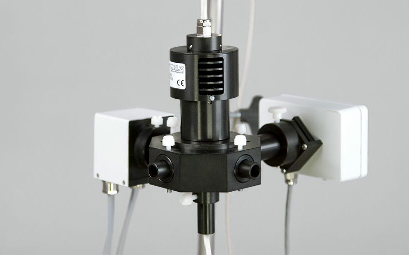 Temperature Control Unit US-T and the Miniature Magnetic Stirrer PHYTO-MS mounted on the optical unit.