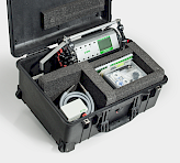 DIVING-PAM-II fluorometer with accessories arranged inside a transport box, including fiber optics, probe holder, cables, and manual