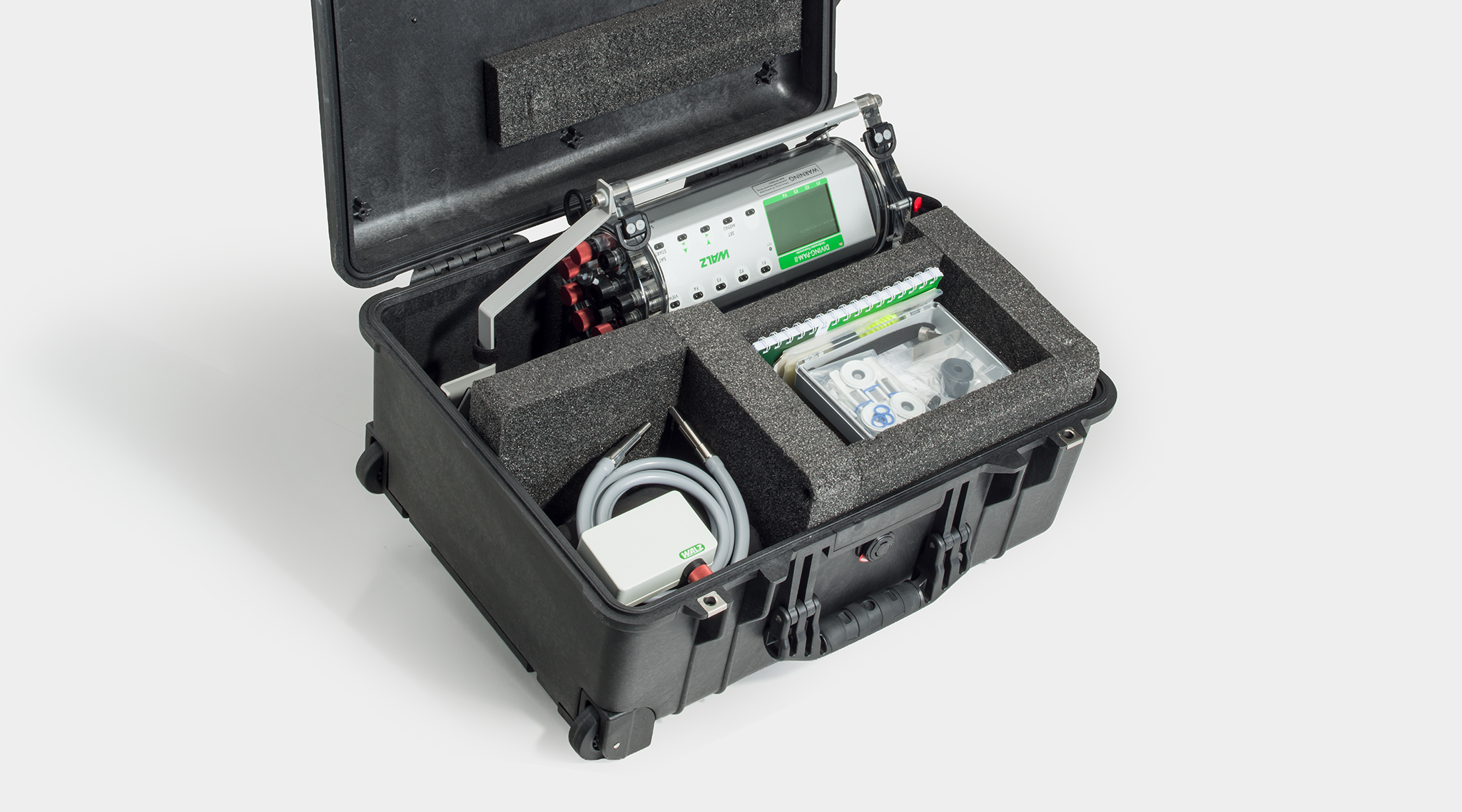 DIVING-PAM-II fluorometer with accessories arranged inside a transport box, including fiber optics, probe holder, cables, and manual